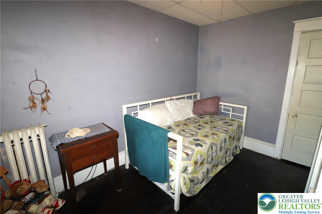 441 Franklin Avenue Palmerton, PA 18071 - Photo 19 of 31 a bed sitting in a bedroom next to a window