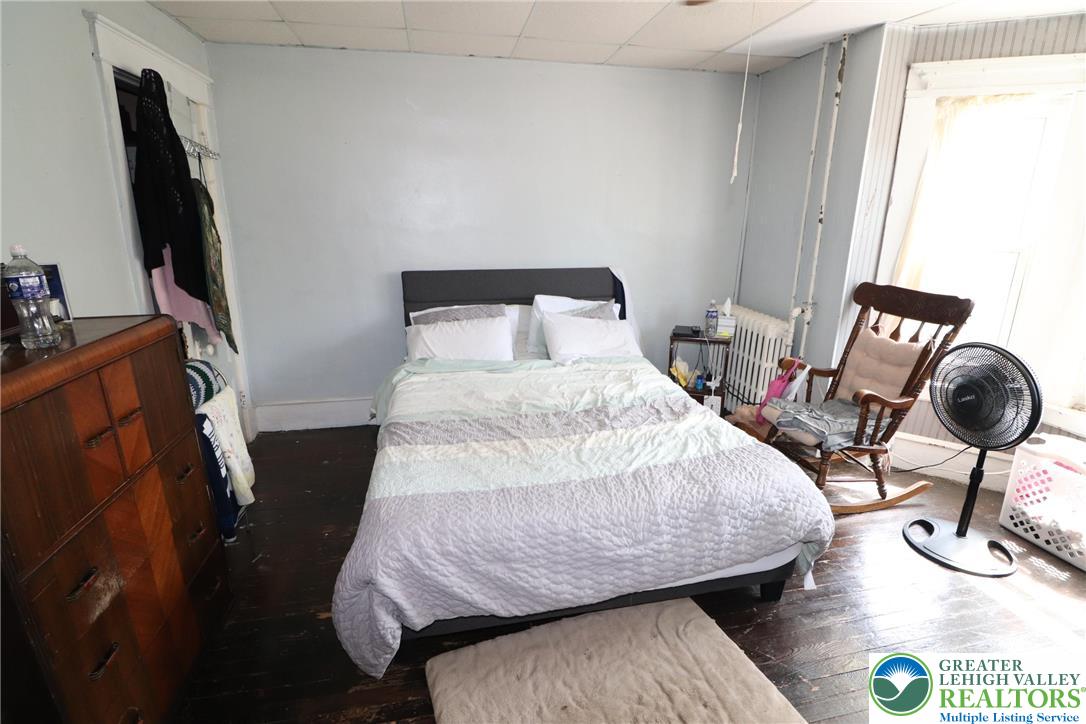441 Franklin Avenue Palmerton, PA 18071 - Photo 21 of 31 a bedroom with a bed a flat screen tv and next to a window