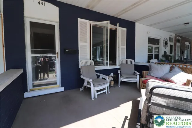 a building outdoor space with patio furniture