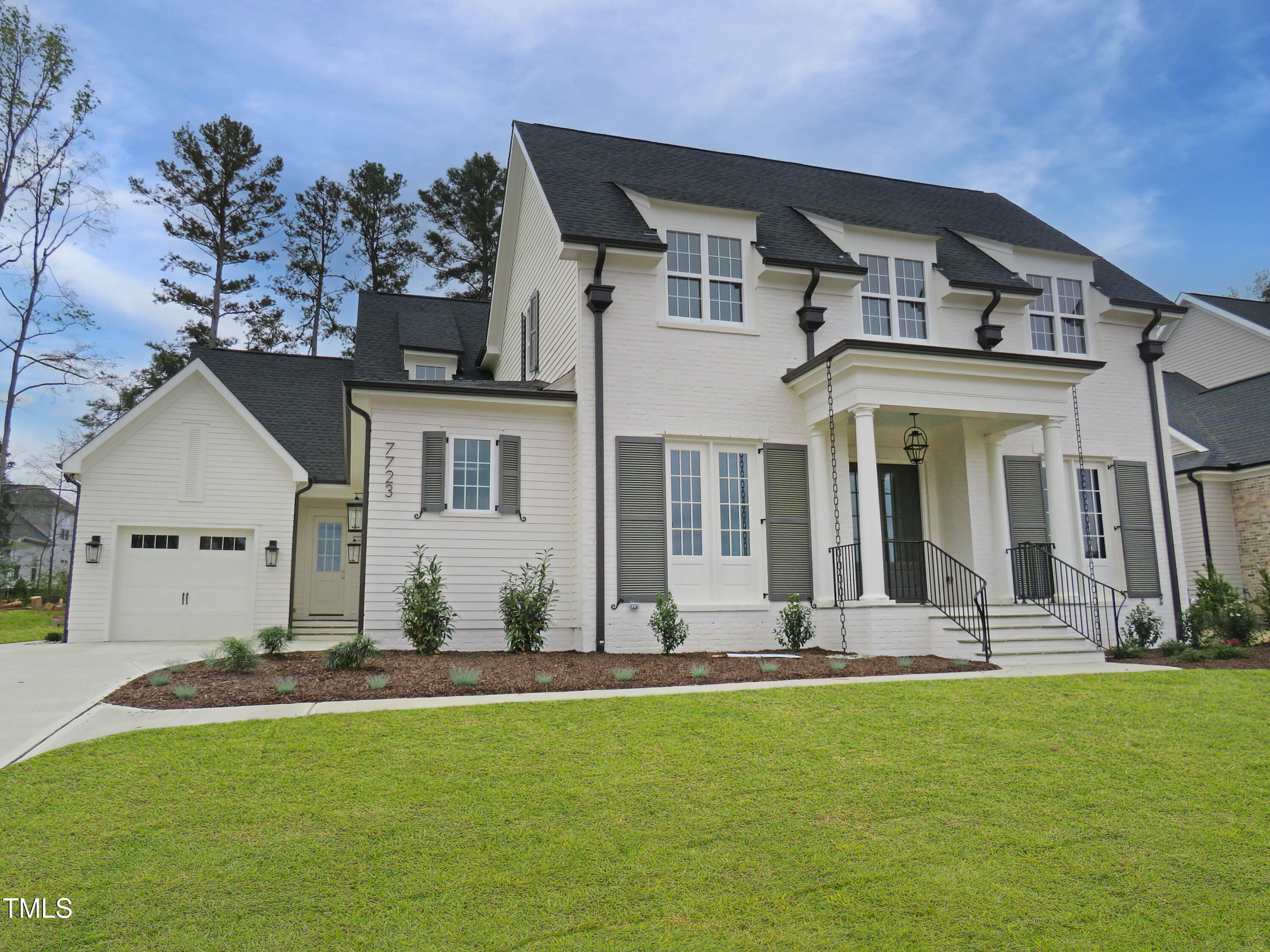 7723 Roberts Road Apex, NC 27523 - Photo 3 of 3 a front view of a house with a yard