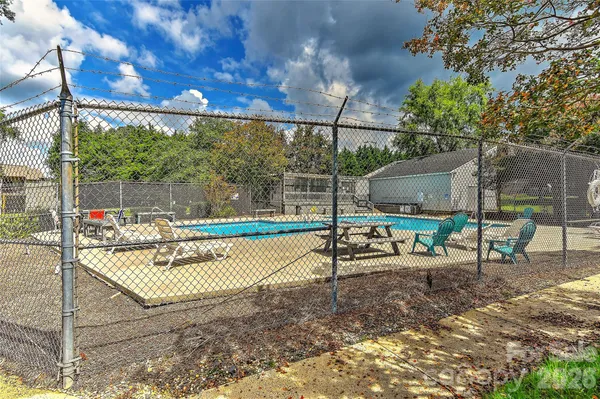 a view of a park with sitting area