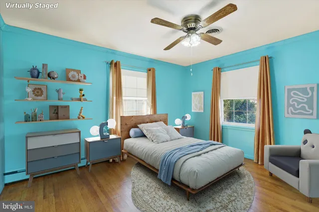 a bedroom with a bed and a couch