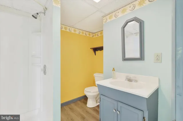 a bedroom with a bed and closet