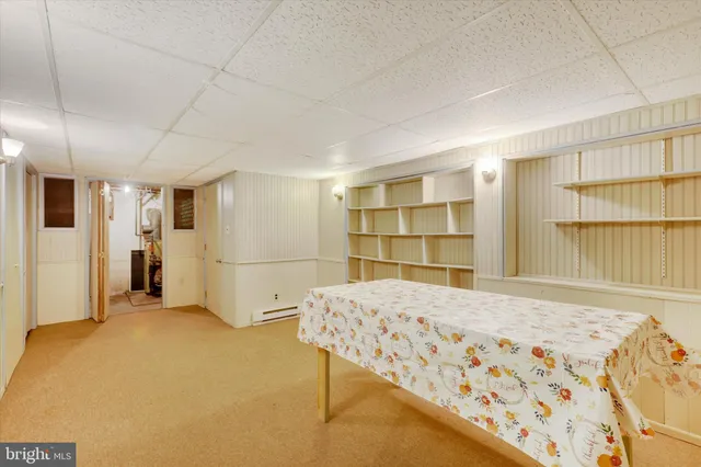 a view of a room with wooden walls