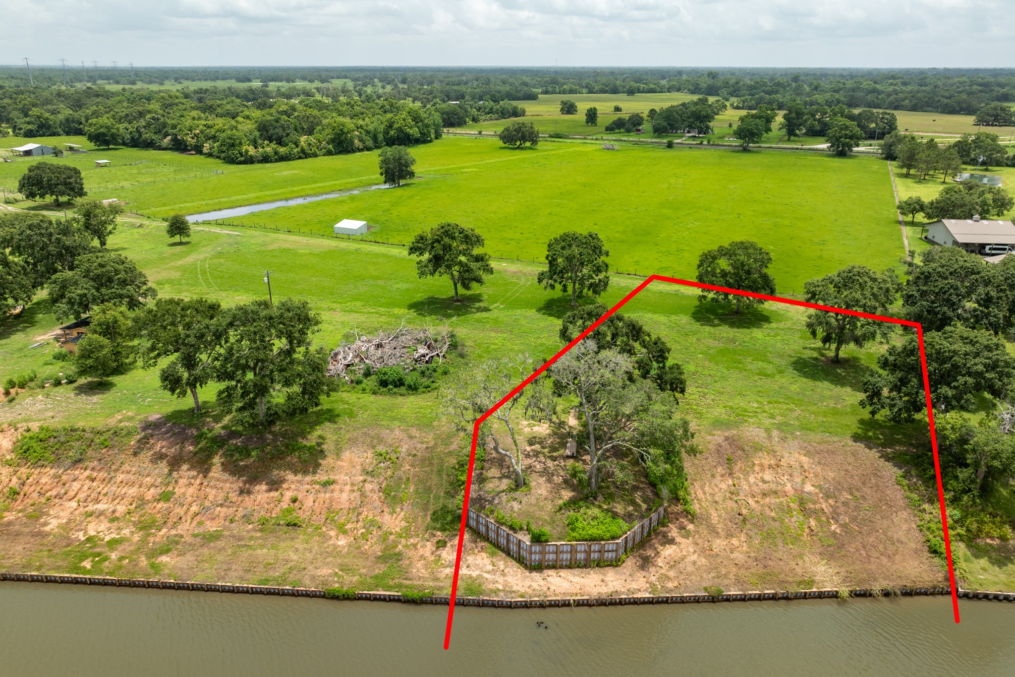 4 County Road 344 Sweeny, TX 77480 - Photo 3 of 6 a view of a lake with a big yard