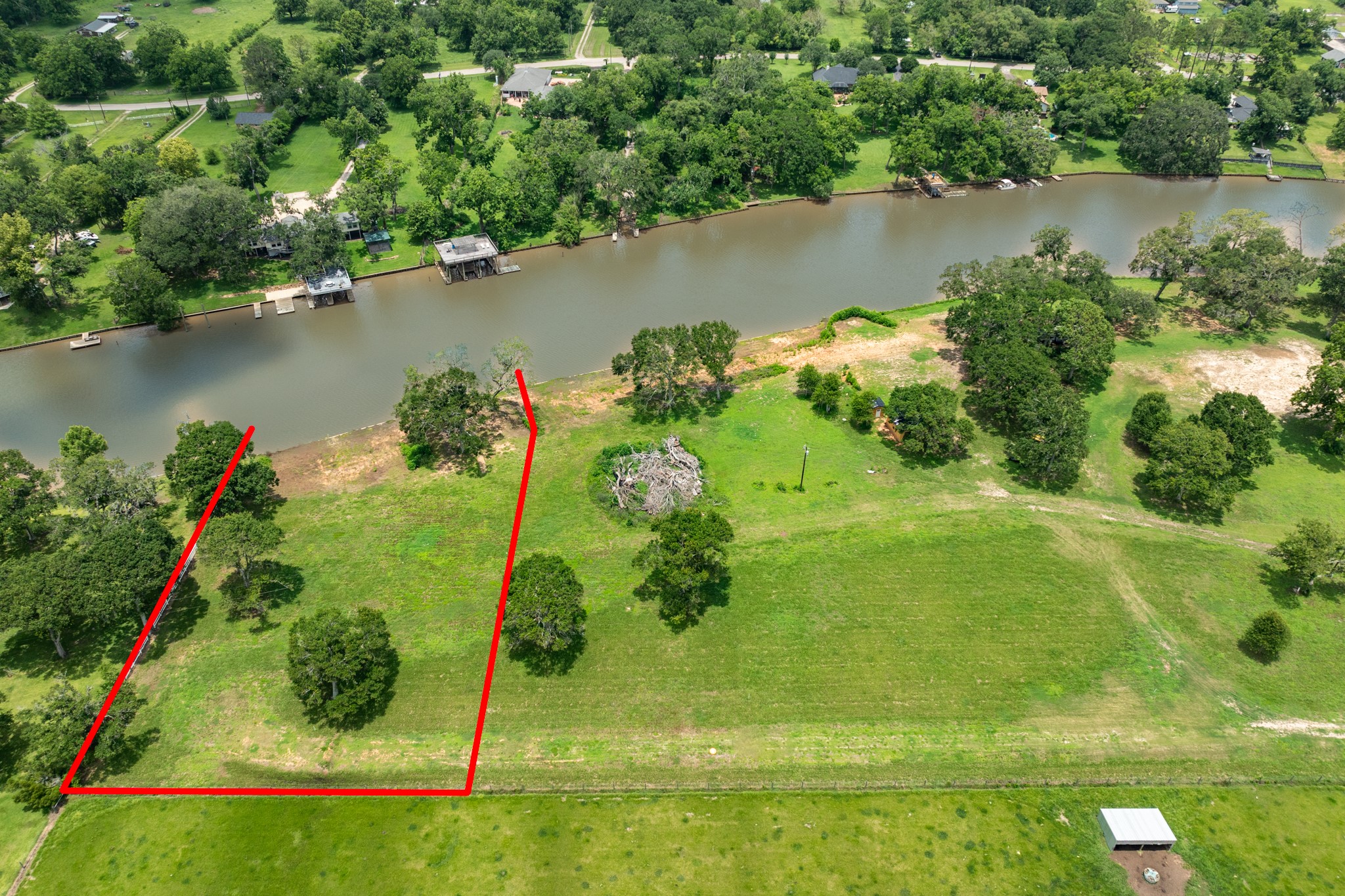 4 County Road 344 Sweeny, TX 77480 - Photo 5 of 6 an aerial view of a residential houses with outdoor space and lake view