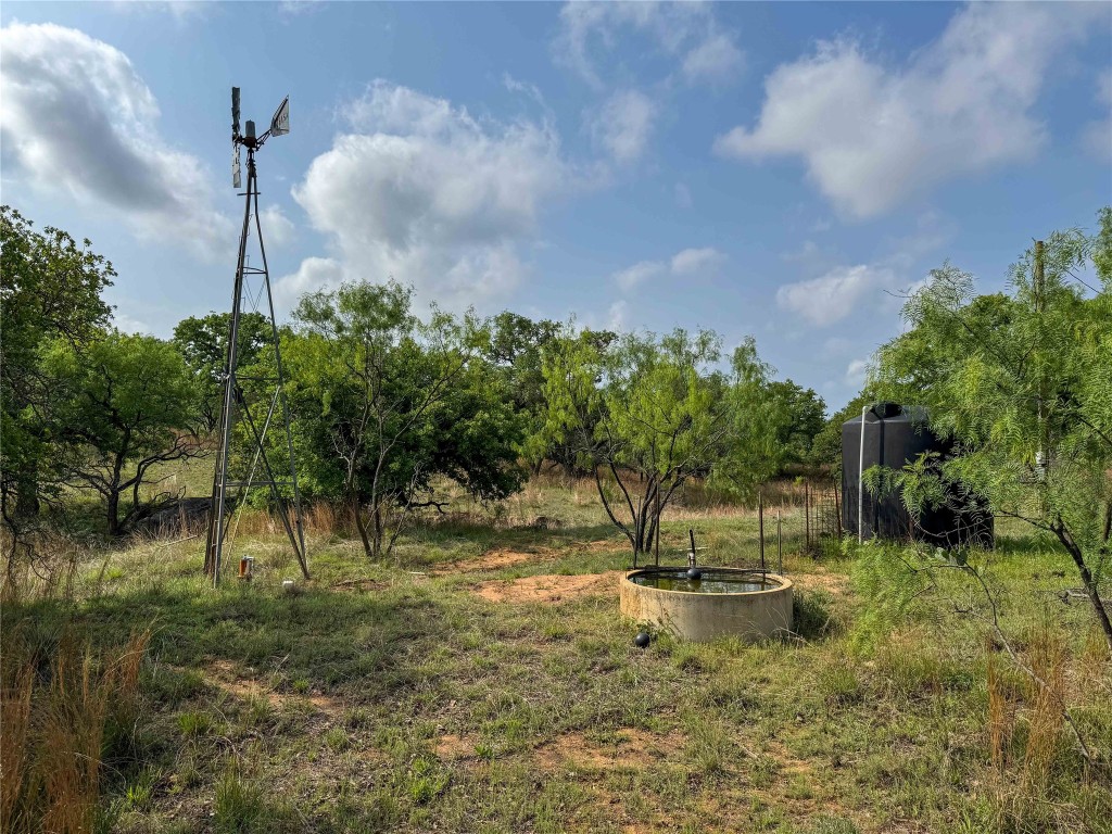 Tbd Fly Gap Road Pontotoc, TX 76869 - Photo 3 of 24 a view of a garden with a bench in the background