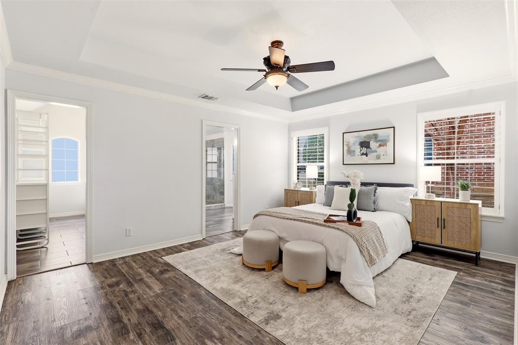 1904 Strait Lane Flower Mound, TX 75028 - Photo 17 of 33 a bedroom with a bed and wooden floor