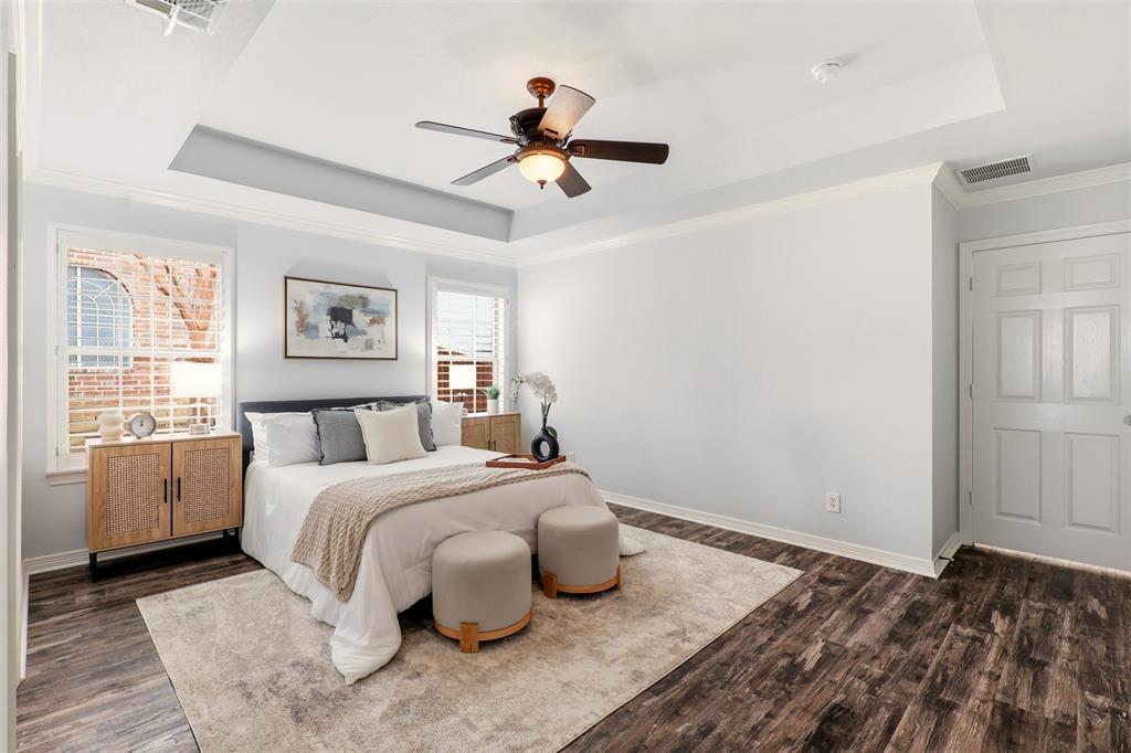 1904 Strait Lane Flower Mound, TX 75028 - Photo 18 of 33 a bedroom with a bed and wooden floor