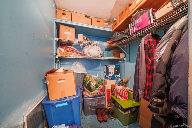 a sitting area with furniture and a window