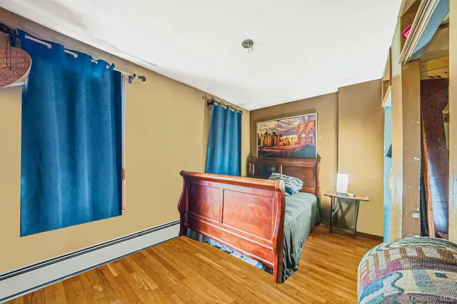 a living room with a couch and a window