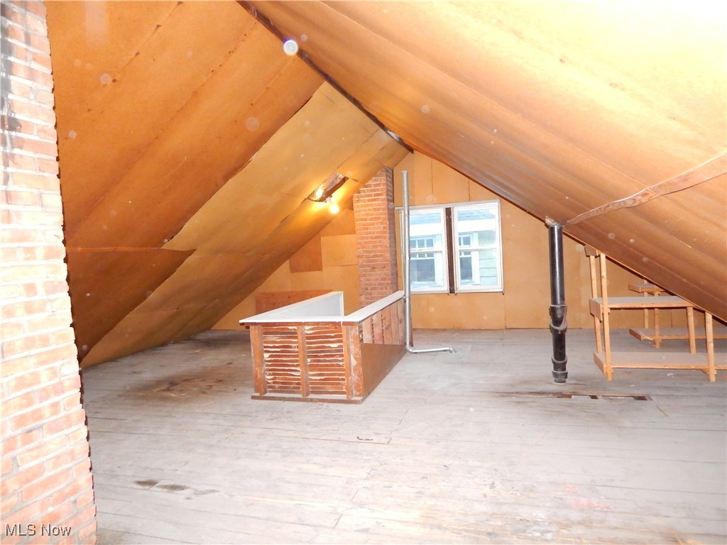 3845 Summit Park Road Cleveland Heights, OH 44121 - Photo 11 of 15 Unfinished attic featuring an upstairs landing