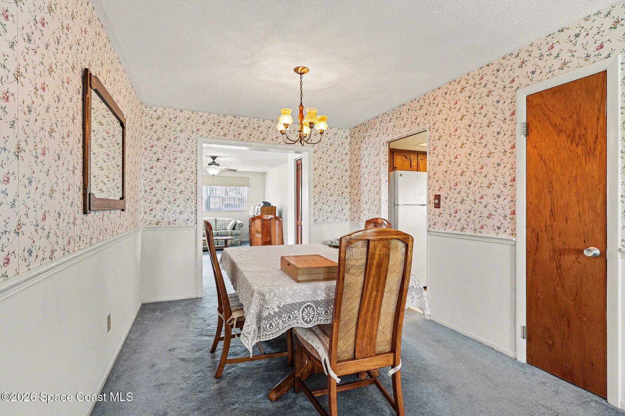 979 Kings Post Road Rockledge, FL 32955 - Photo 5 of 15 a dining room with furniture and window