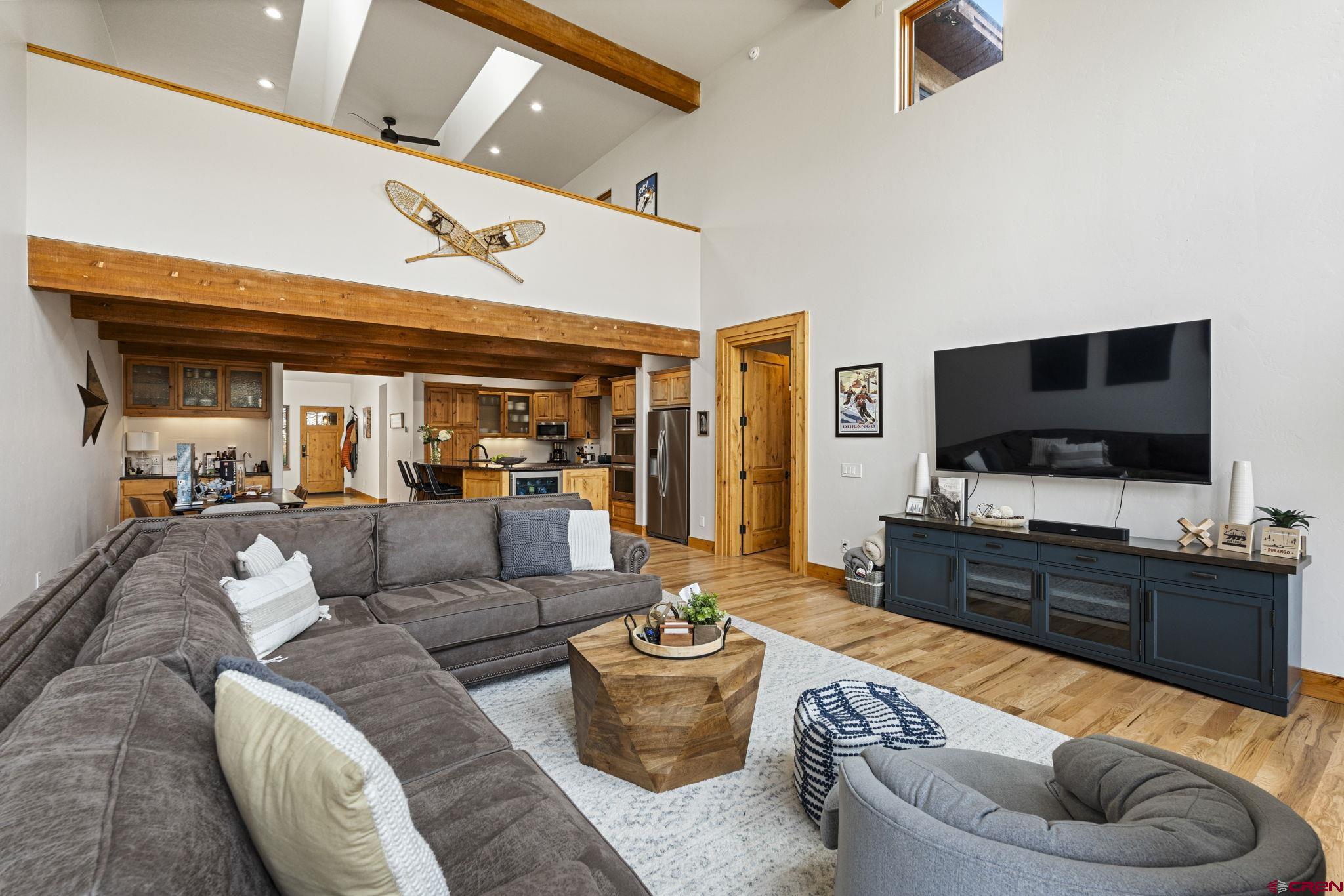 95 Turnberry Drive Durango, CO 81301 - Photo 11 of 36 a living room with furniture and a flat screen tv