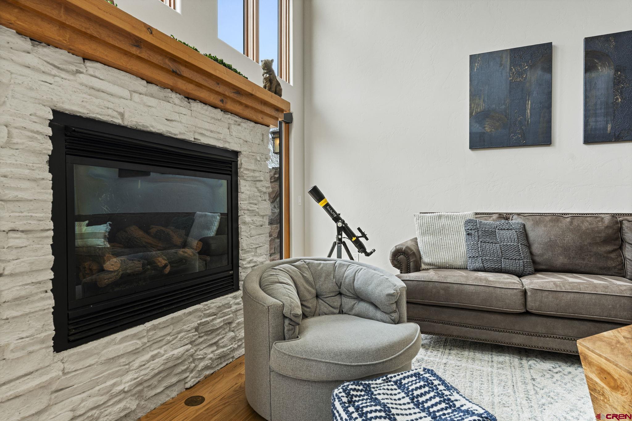 95 Turnberry Drive Durango, CO 81301 - Photo 13 of 36 a living room with furniture and a fireplace