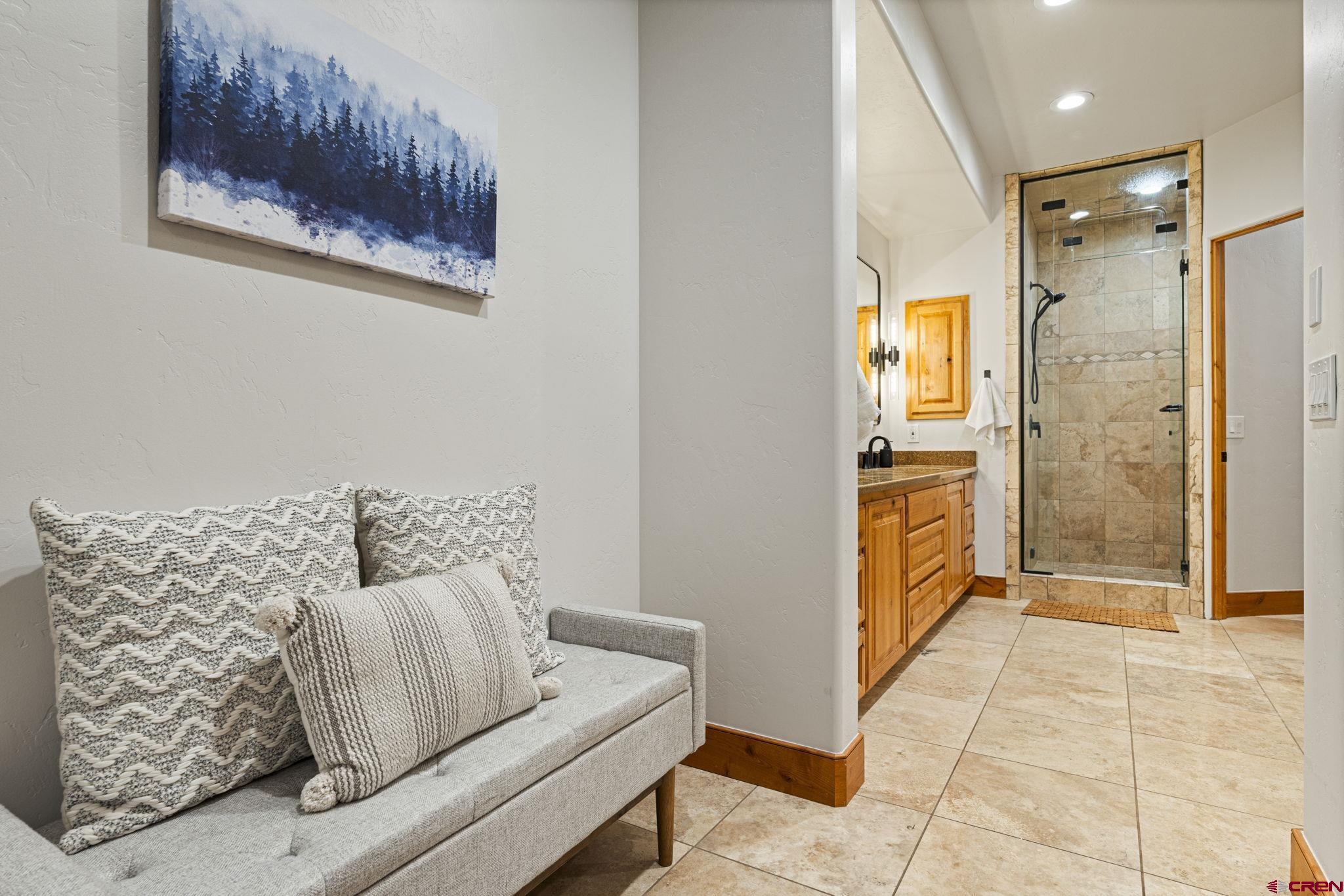 95 Turnberry Drive Durango, CO 81301 - Photo 18 of 36 a living room with furniture and a glass door