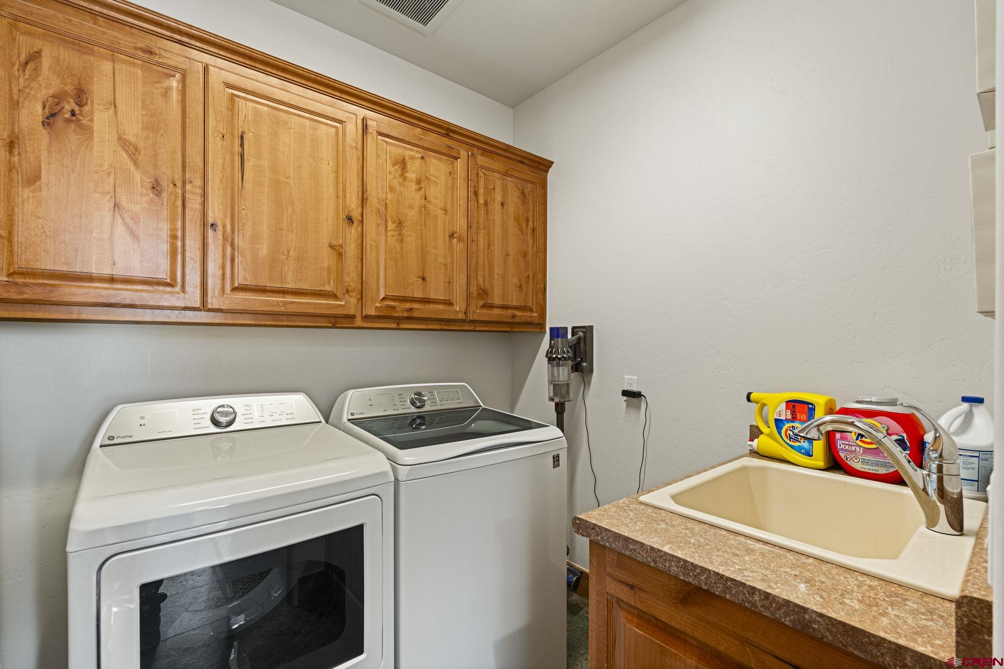 95 Turnberry Drive Durango, CO 81301 - Photo 27 of 36 a utility room with dryer and washer