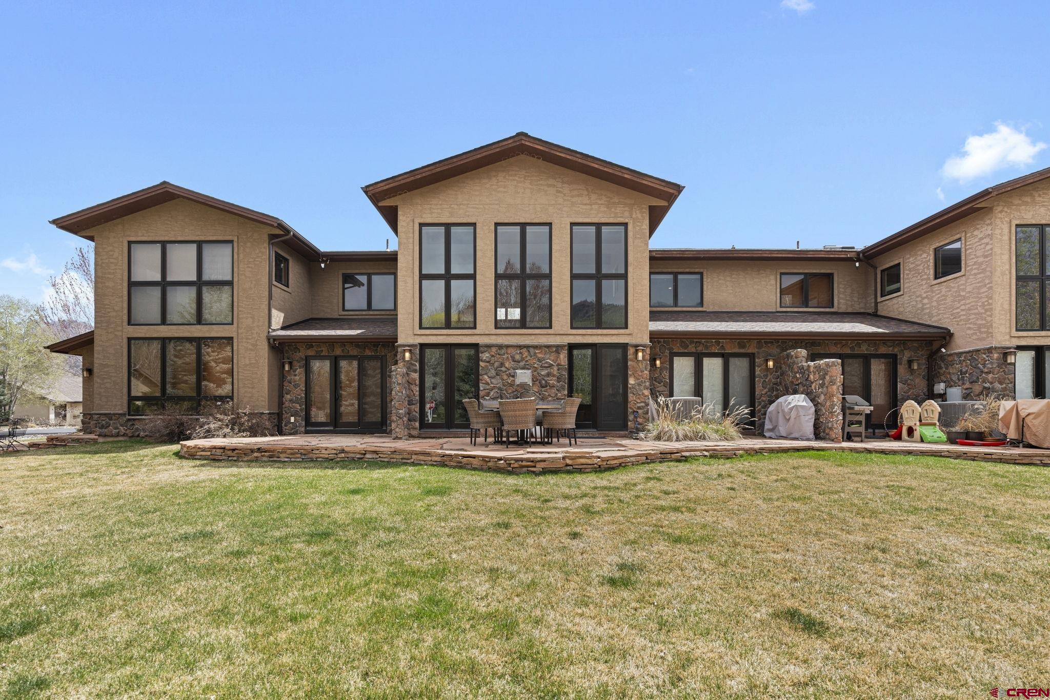 95 Turnberry Drive Durango, CO 81301 - Photo 30 of 36 a front view of a house with garden