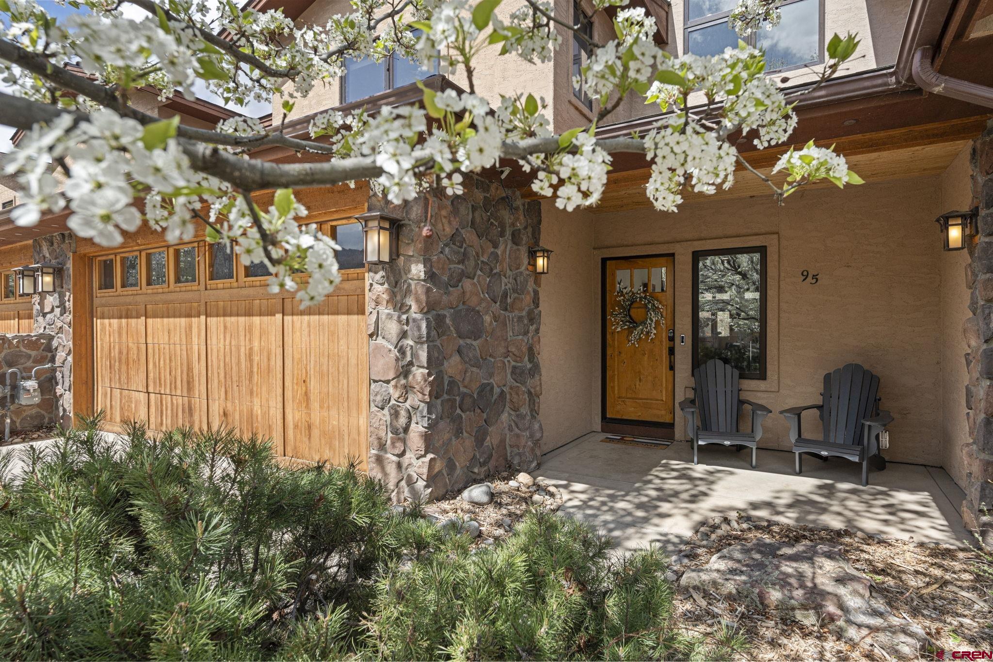 95 Turnberry Drive Durango, CO 81301 - Photo 3 of 36 a view of a chairs and table in a porch