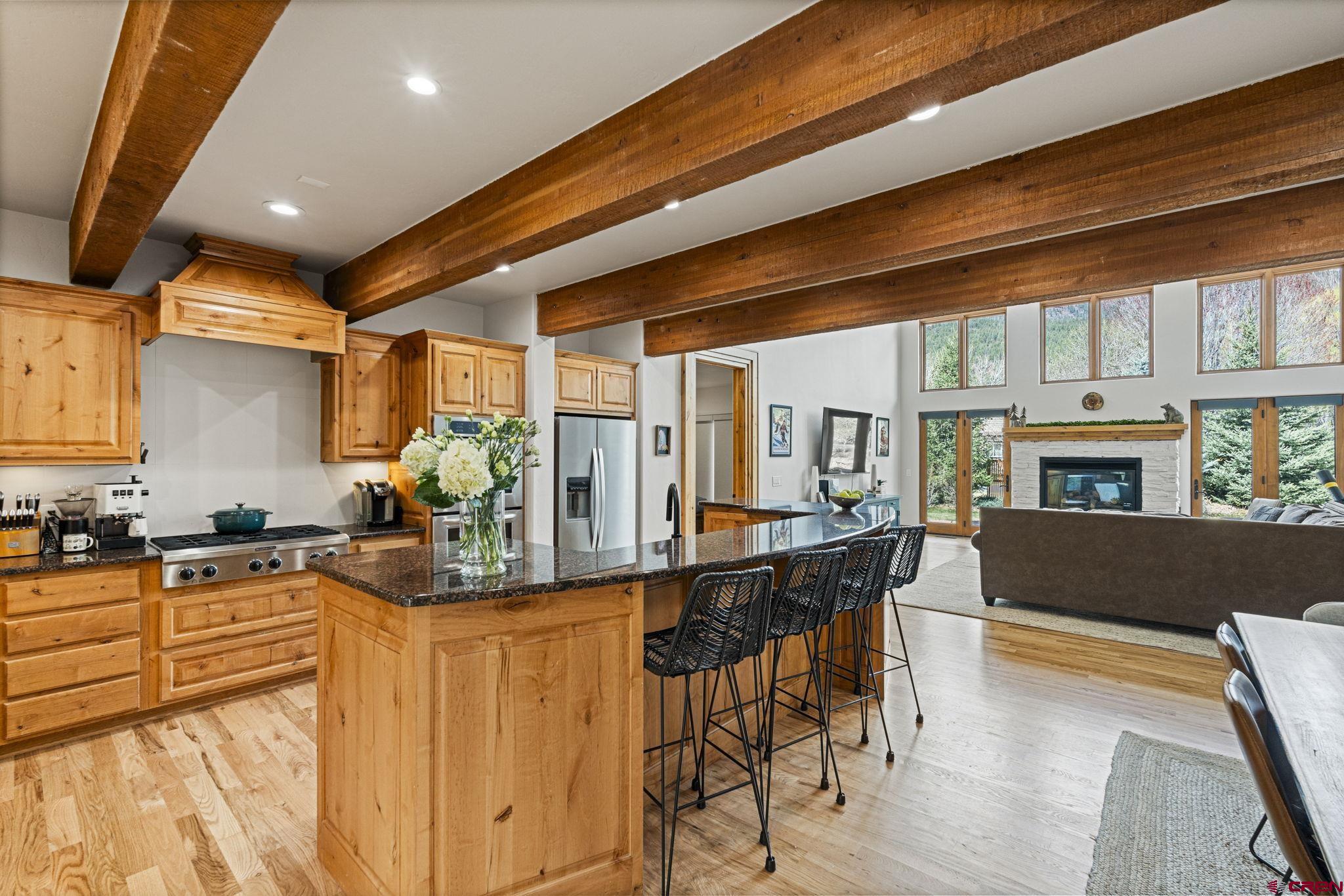 95 Turnberry Drive Durango, CO 81301 - Photo 5 of 36 a kitchen with stainless steel appliances granite countertop a sink and cabinets