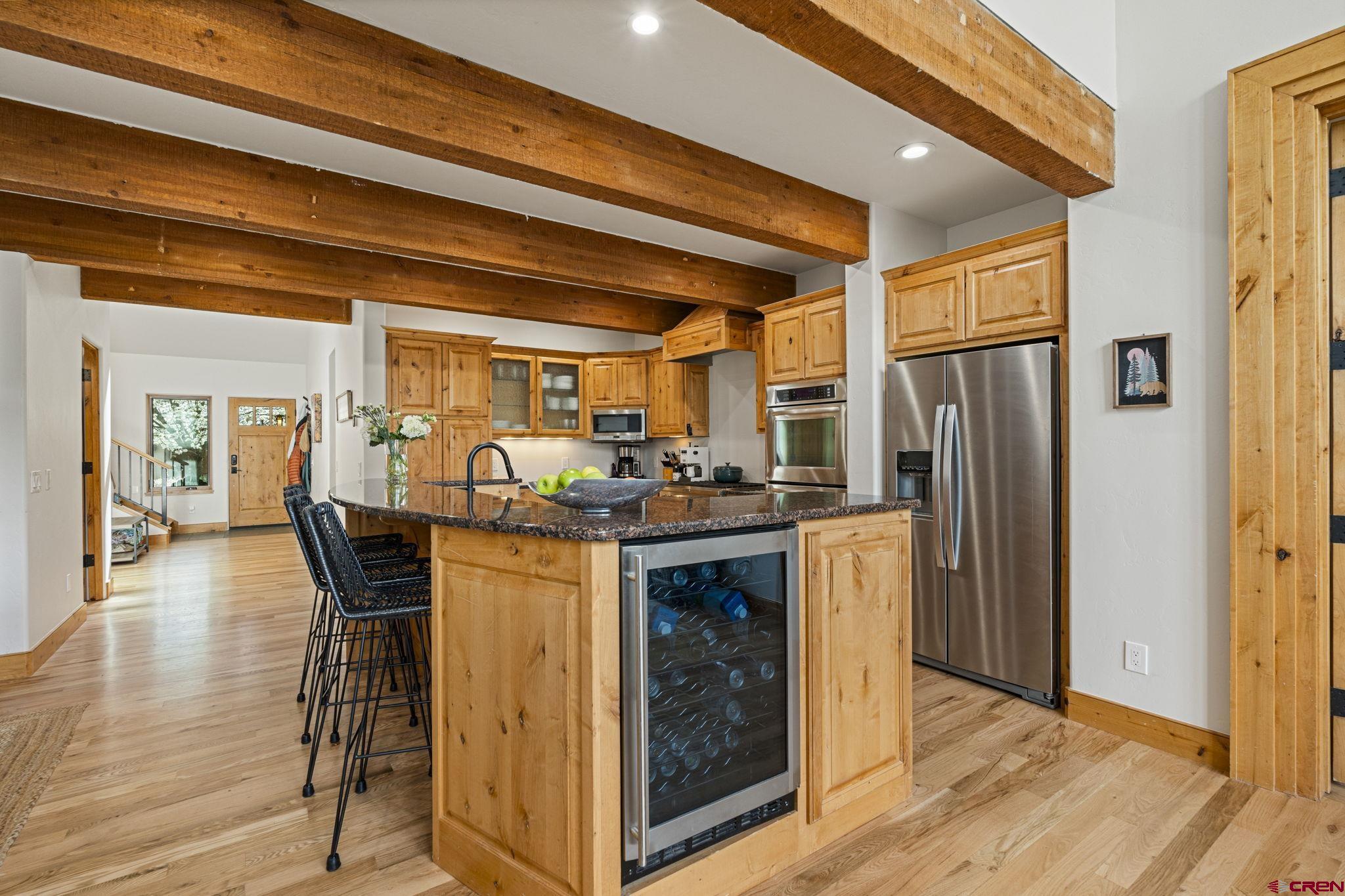 95 Turnberry Drive Durango, CO 81301 - Photo 9 of 36 a kitchen with stainless steel appliances granite countertop a refrigerator and a stove top oven