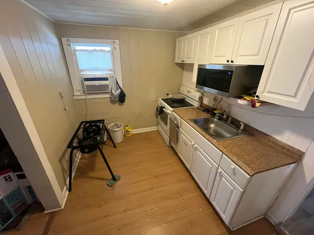 a room with storage and utility