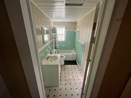 a bathroom with sink and toilet