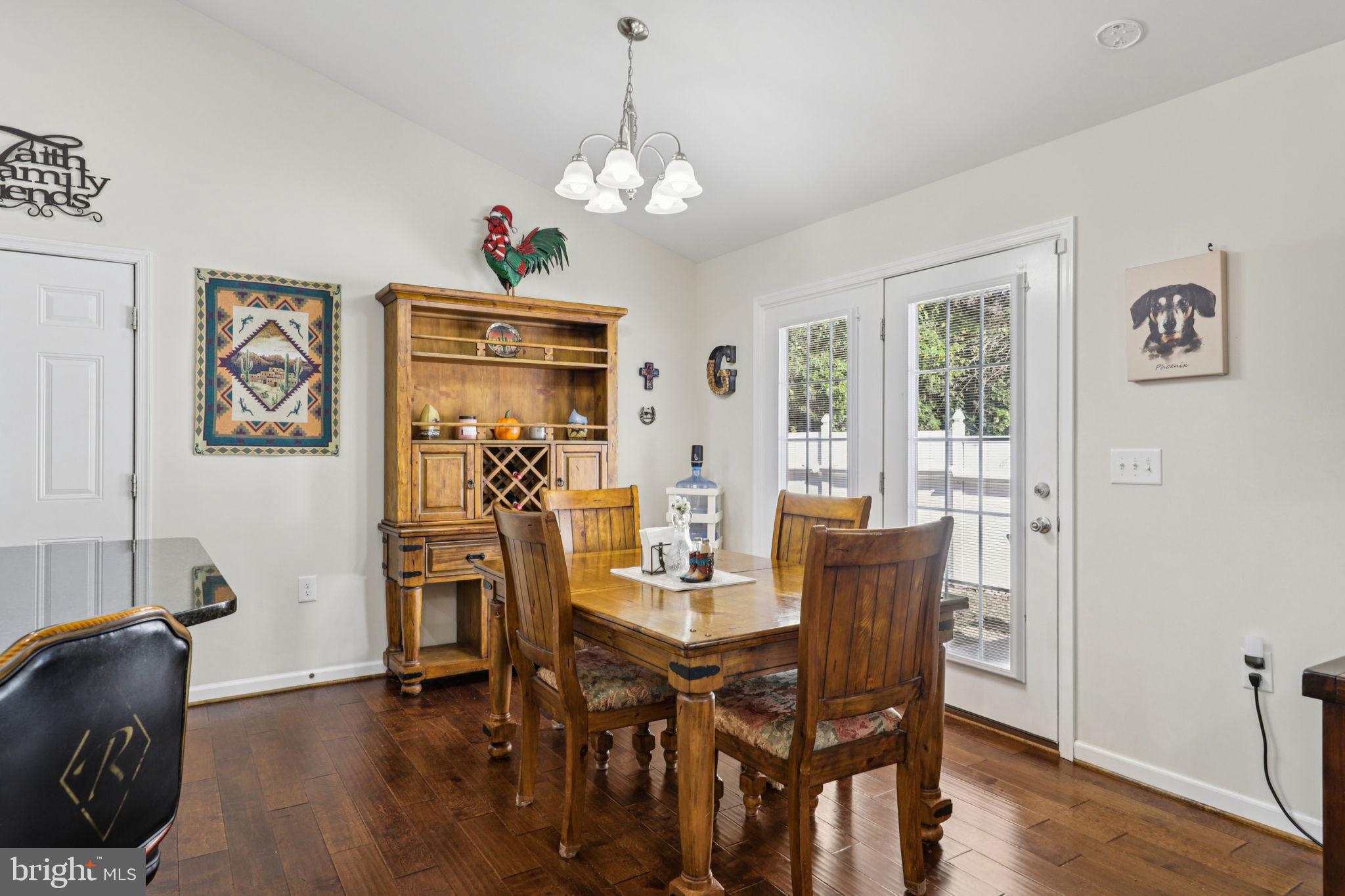 268 Shannon Court Inwood, WV 25428 - Photo 5 of 26 a view of a dining room with furniture and wooden floor