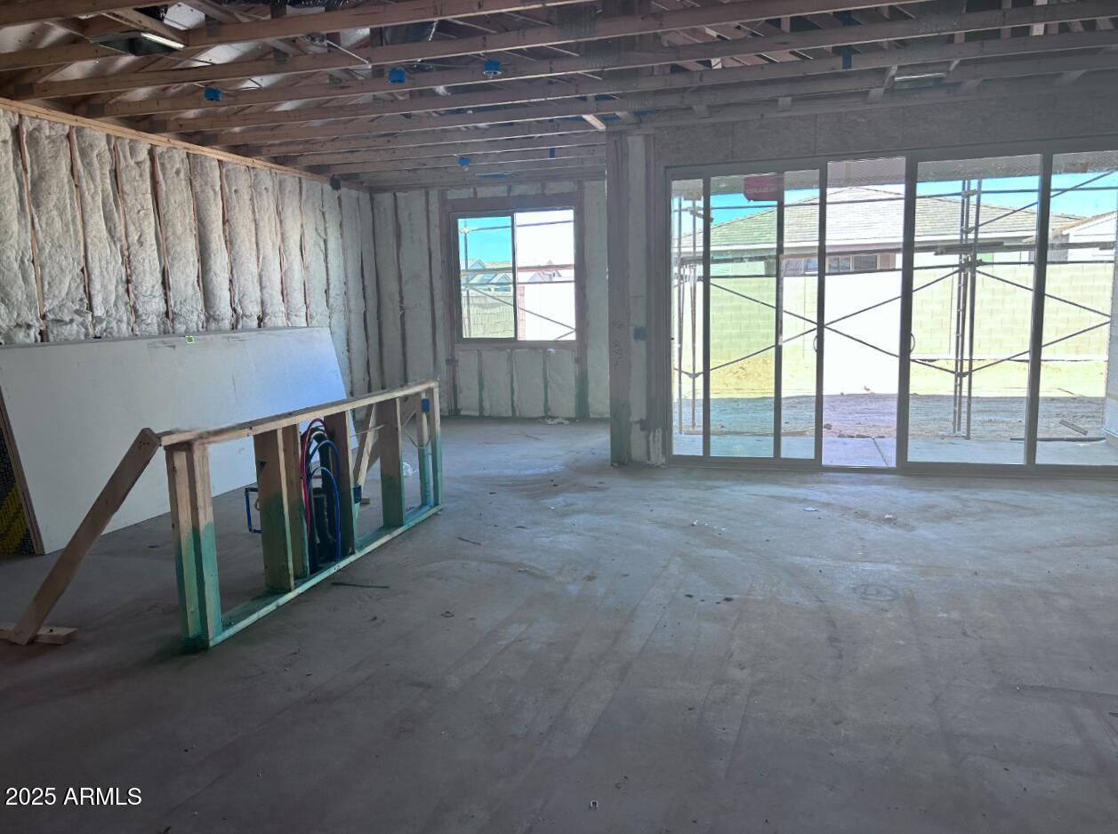 2586 Rustler Road San Tan Valley, AZ 85140 - Photo 6 of 12 a view of an empty room with a window