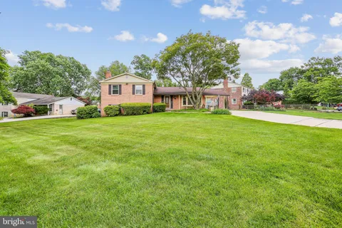 a view of a house with a big yard
