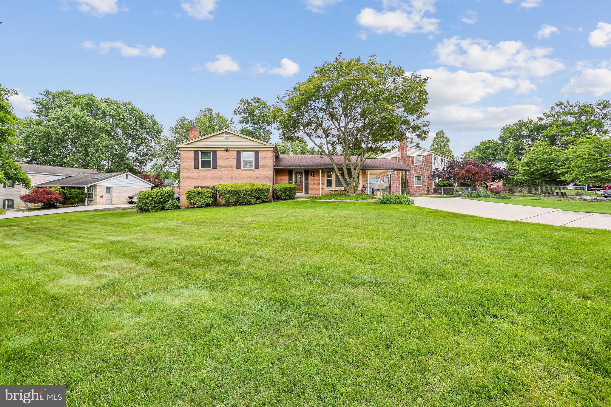 a view of a house with a big yard