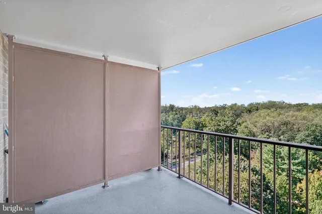 a view of a balcony with an outdoor space