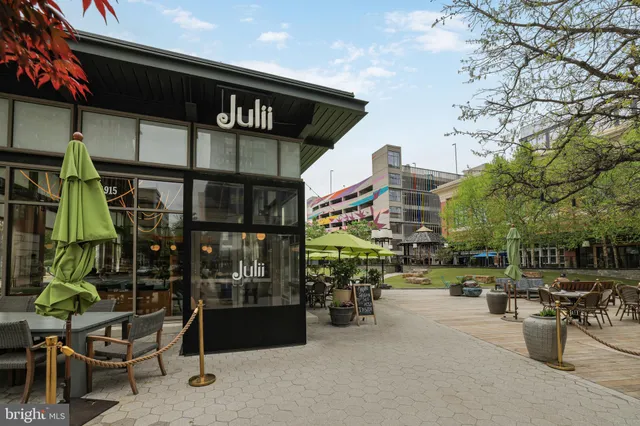 a view of a chairs and table in a patio