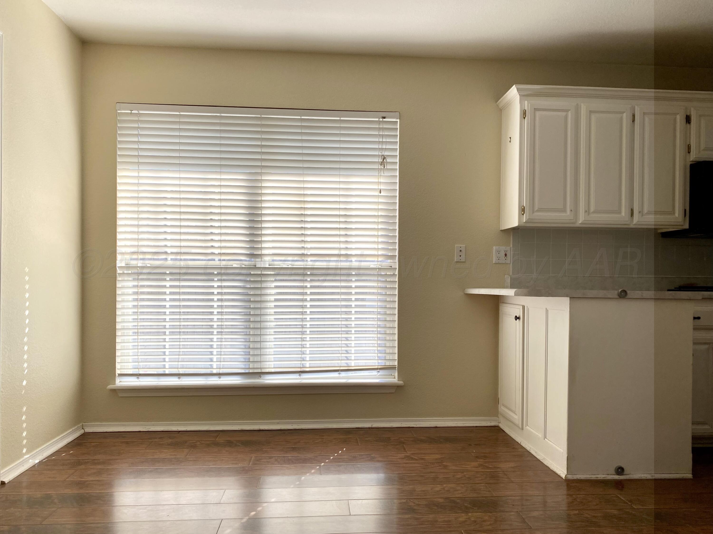 7903 Goal Place Amarillo, TX 79119 - Photo 4 of 14 a view of a window in a kitchen