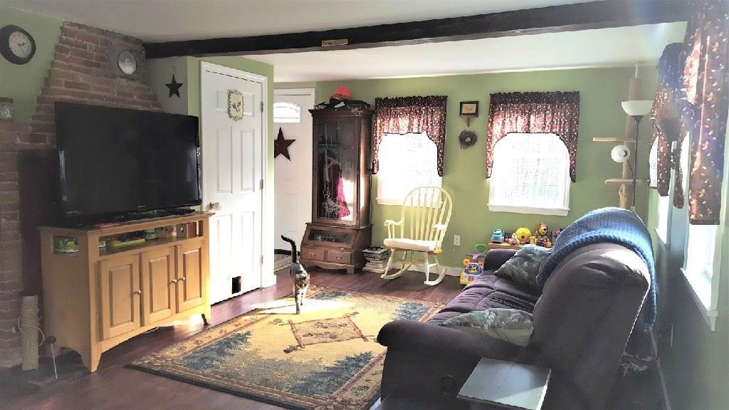 455 Wentworth Road Embden, ME 04958 - Photo 9 of 35 View of the living room from the...