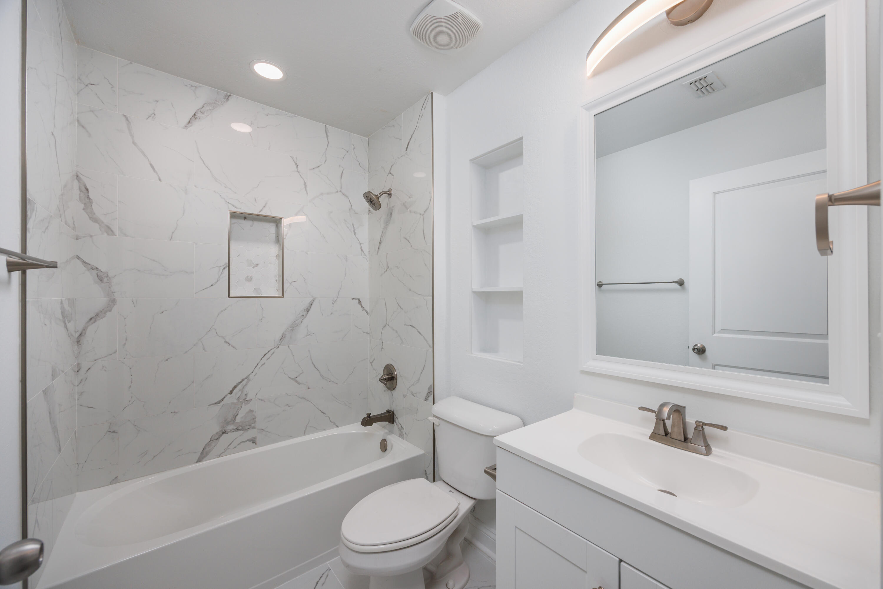 16 South Sand Palm Road Freeport, FL 32439 - Photo 17 of 32 a bathroom with a sink toilet and shower