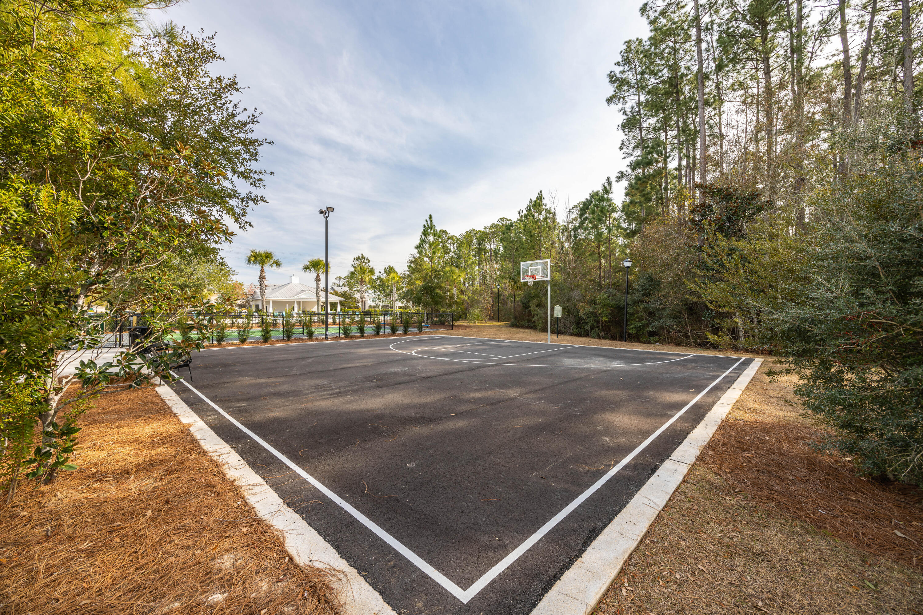 16 South Sand Palm Road Freeport, FL 32439 - Photo 24 of 32 a view of a tennis court