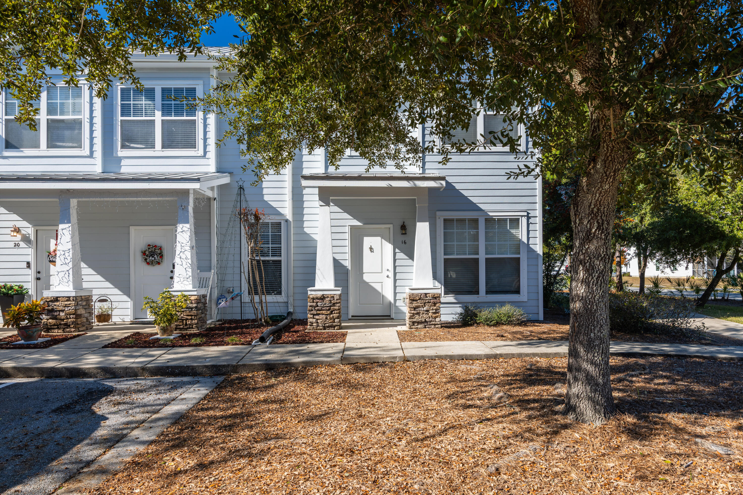 16 South Sand Palm Road Freeport, FL 32439 - Photo 26 of 32 a front view of a house with entertaining space