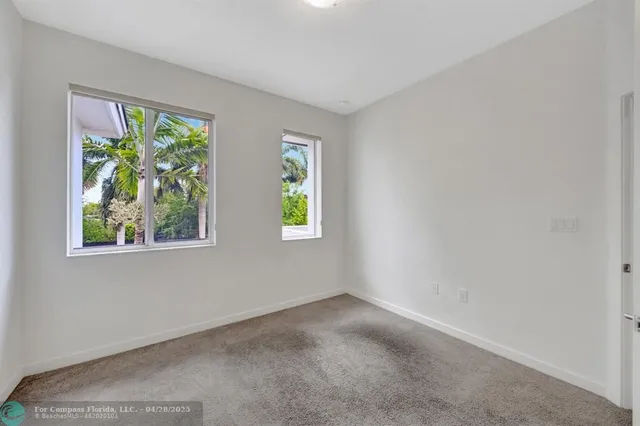 a bathroom with a bathtub shower sink double vanity and a toilet