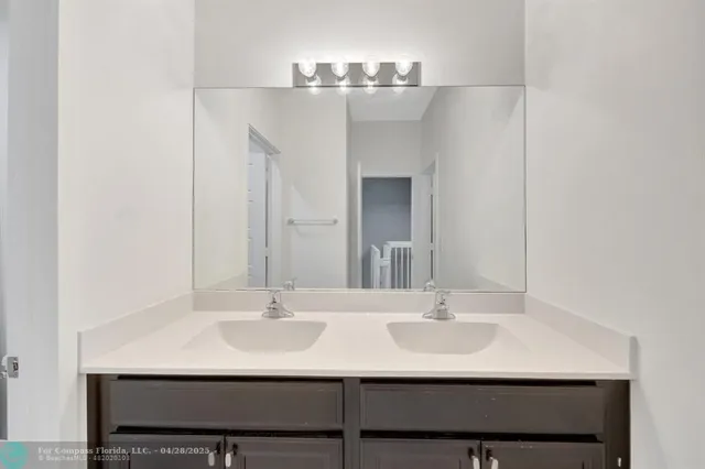 a bathroom with a shower curtain