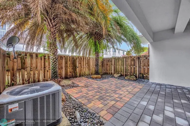 a front view of a house with yard