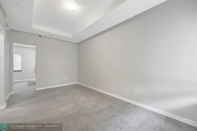 a white toilet sitting next to a white house