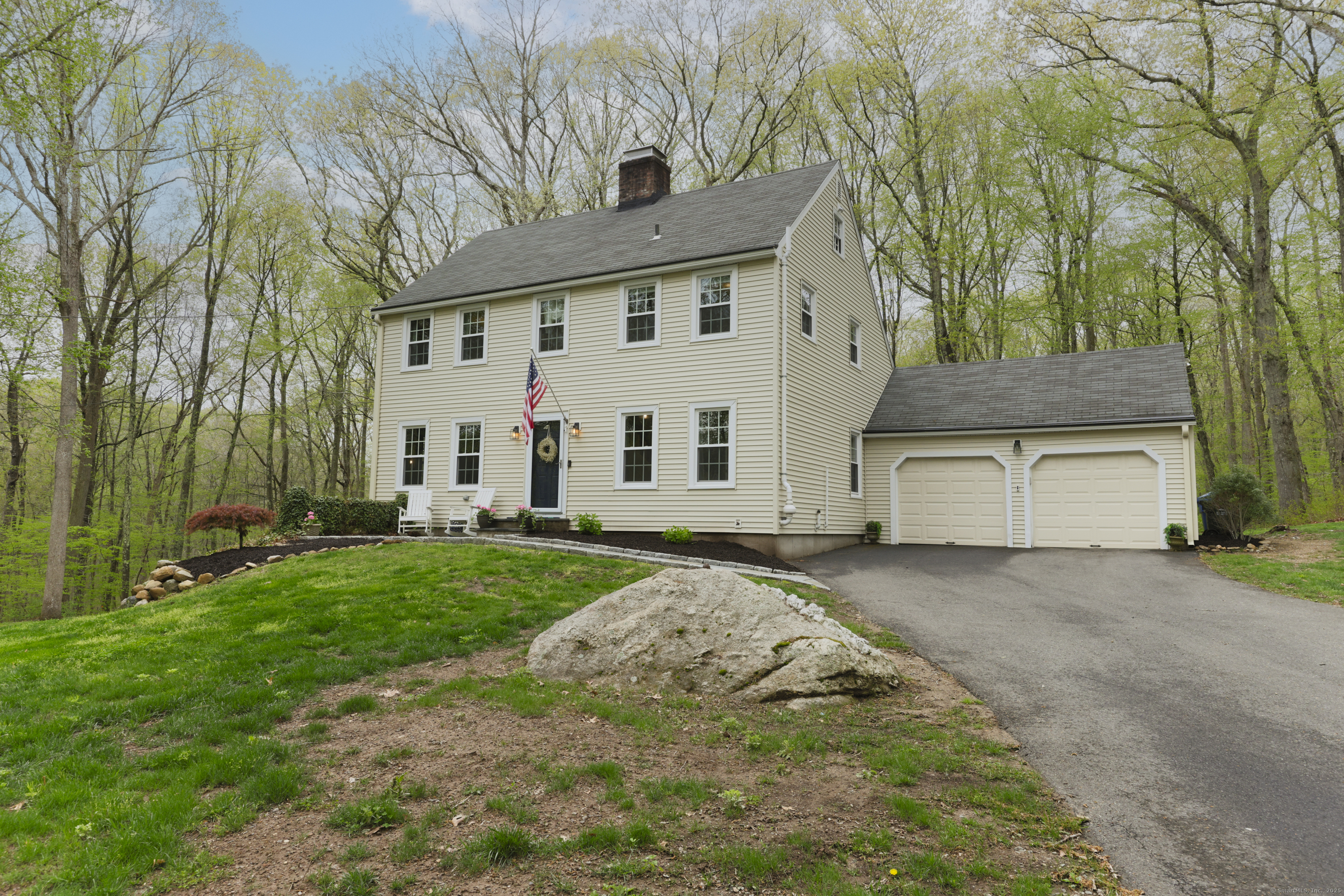front view of a house with a yard