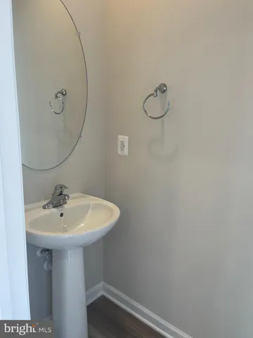 a kitchen with a sink stove and refrigerator