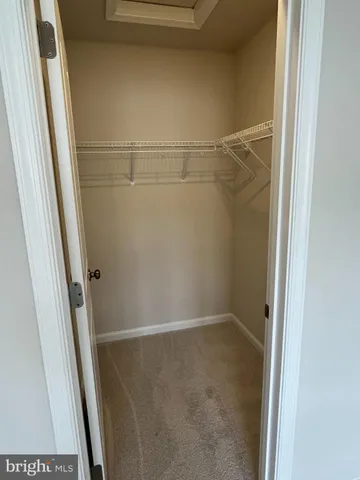 a view of a kitchen with a washer and dryer