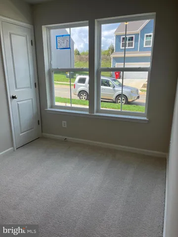 a bathroom with a bathtub shower sink vanity and toilet