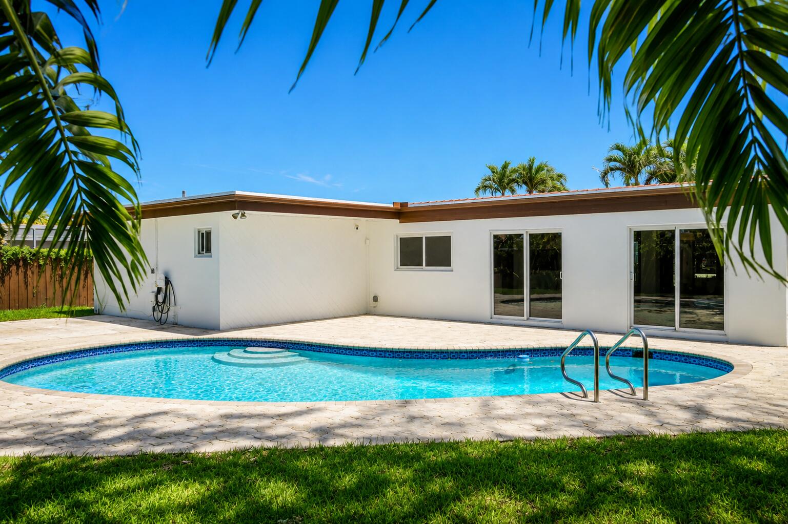 4815 Cleveland Street Hollywood, FL 33021 - Photo 28 of 31 a backyard of a house with seating space