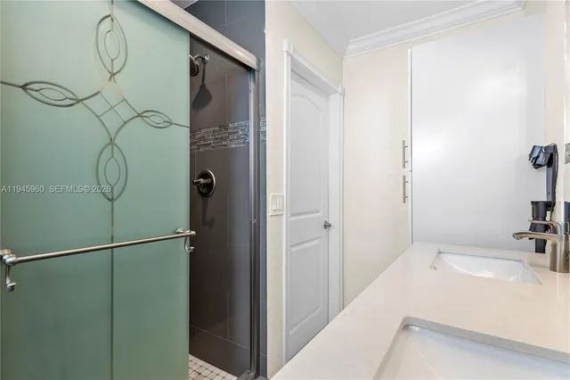 a bathroom with a tub and a sink