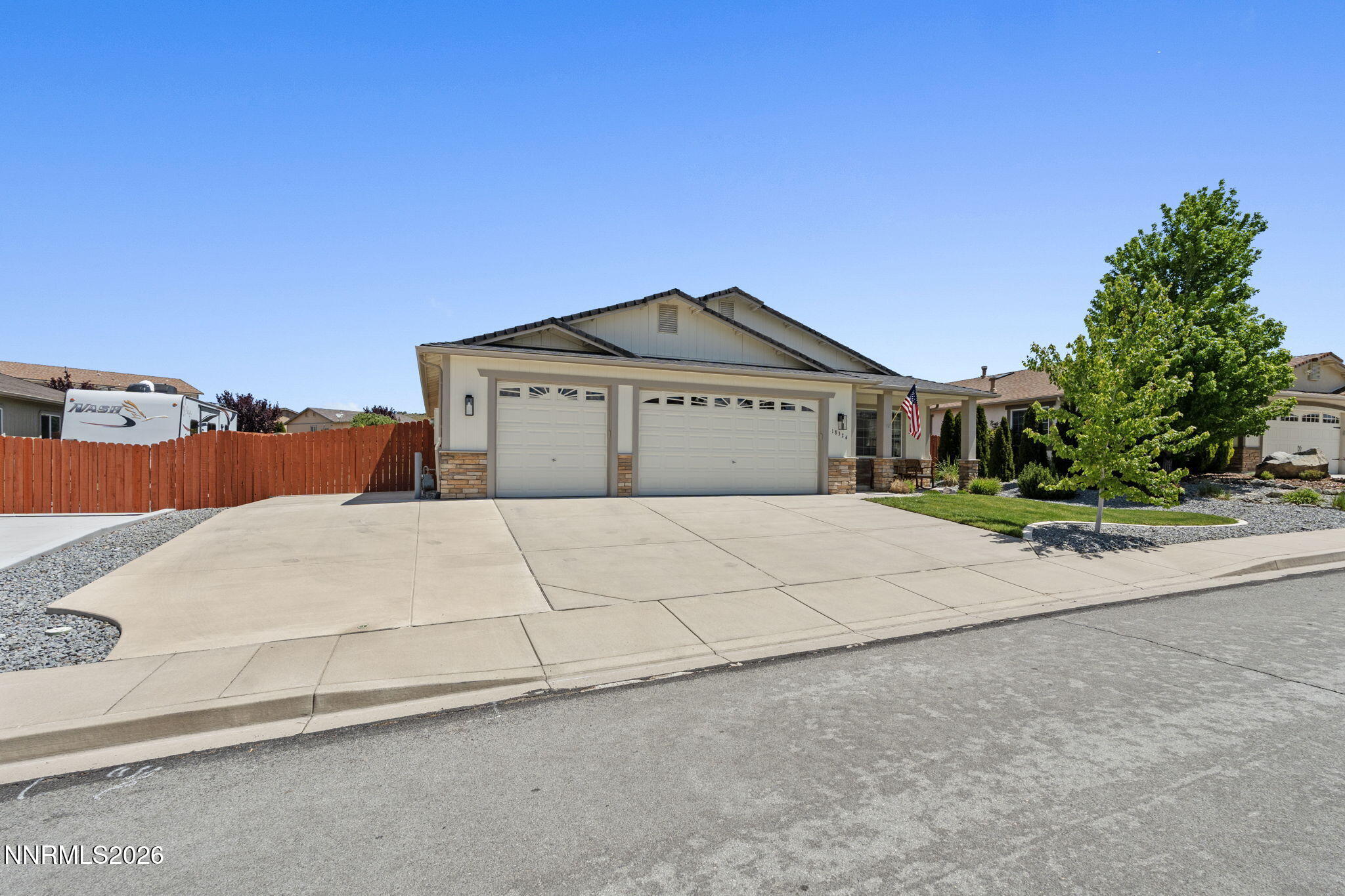 18324 Panda Bear Court Reno, NV 89508 - Photo 39 of 44 a front view of a house with a yard