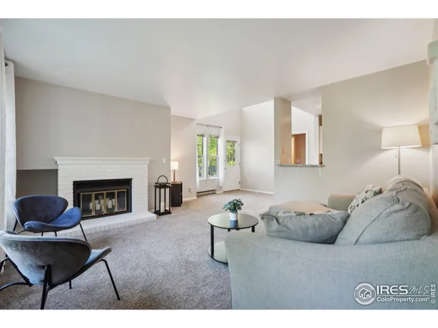 a kitchen with granite countertop a stove and a sink